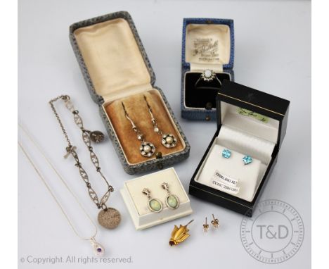 A collection of jewellery to include; a silver pendant and chain, an Irish silver bracelet, a pair of opal earrings and furth