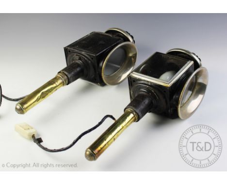 A pair of 19th century coaching lamps, with brass mounts and bevelled glass panels, converted for electricity, 45cm high (2) 