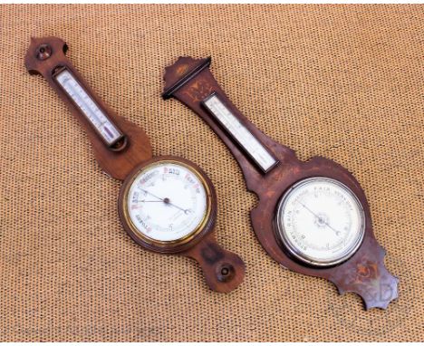 An Edwardian inlaid mahogany aneroid barometer, with mercury thermometer, 87cm, with another barometer named for S & T Maddoc