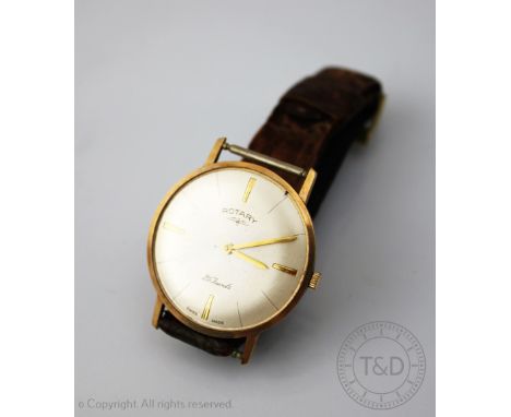 A Rotary wristwatch, the yellow gold circular case enclosing silvered dial with batons, marked '21 Jewels, Swiss Made', with 