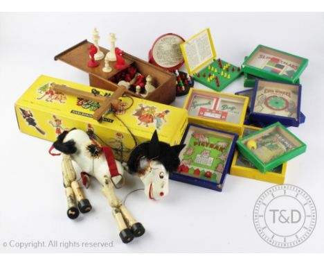 A late 19th century Staunton pattern bone chess set, in mahogany box, with a Pelham horse puppet and various vintage games (Q