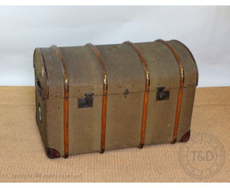 A vintage canvas and bentwood dome top trunk, with internal tray, old GWR labels etc, 66cm H x 100cm W 