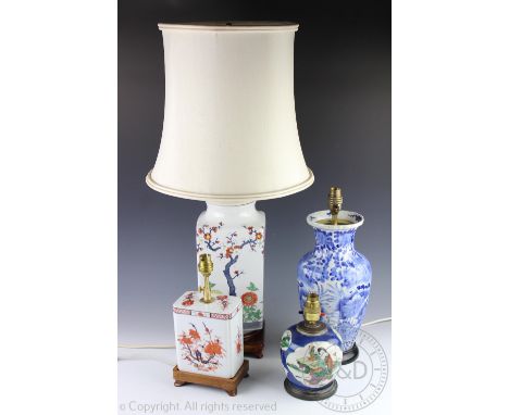 A large Kakiemon pattern square lamp base with stand and cream shade, 75cm high (inc shade) a Kangxi style ovoid lamp base 20