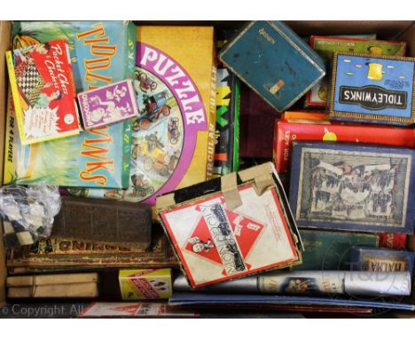 A collection of vintage board and parlour games including, Tiddley Winks, Monopoly, The Games of Halma, Bingo, Lenny the Lion