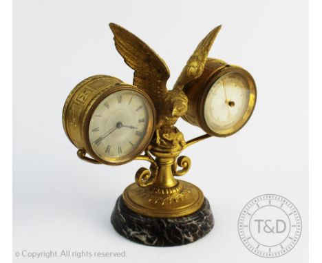 A 19th century French gilt metal combination desk time piece / aneroid barometer, modelled as an eagle, with silvered dials, 