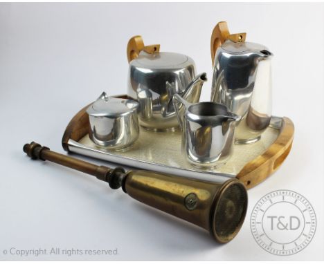 A Picquot Ware stainless steel five piece tea and coffee service, inclusive of tray, with a brass car horn (lacking rubber ba