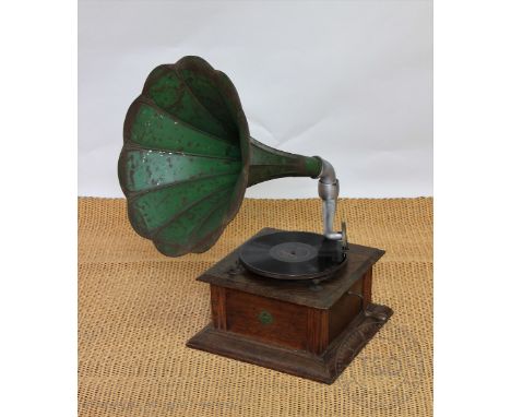 A vintage oak Perophone gramophone, with green metal horn, 37cm at base