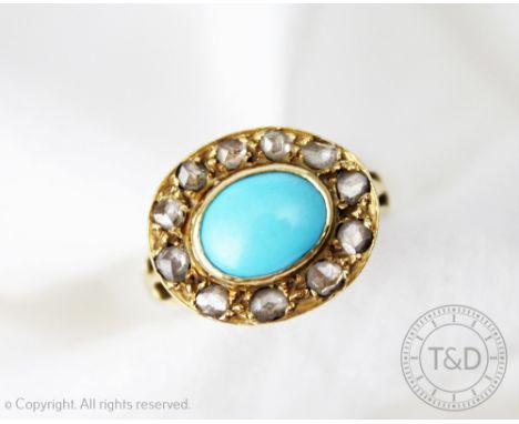 An untested turquoise and diamond set cluster ring, the central oval turquoise within a surround of eleven rose cut diamonds,