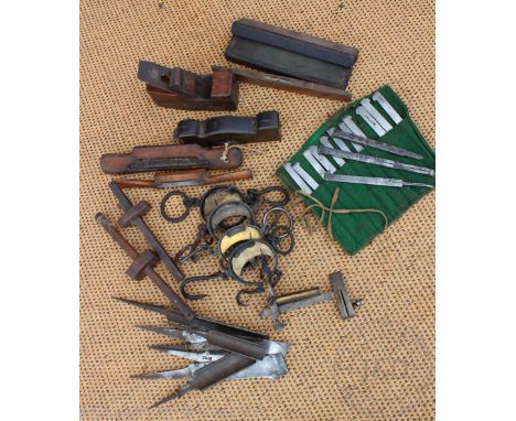 A vintage brass and wood shoulder plane, with a selection of other carpentry tools, four weighing scales and a set of brass s