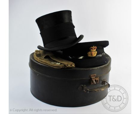 A Christies of London top hat, named on the leather interior, interior aperture 15.5cm x 19.5cm (approx), with a Kings Shrops