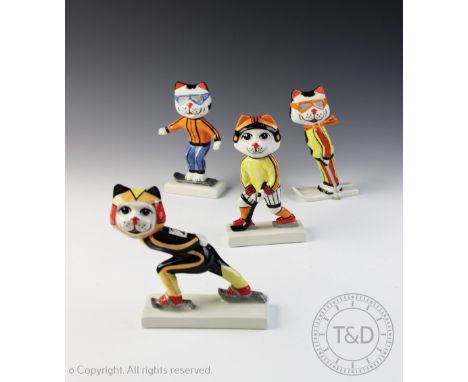 Four Lorna Bailey 'Winter Olympic' pottery model cats, comprising a skier, speed skater, hockey player and snow boarder, tall