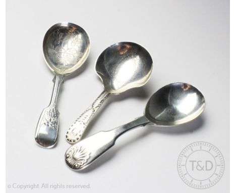 Three silver caddy spoons comprising; Thomas Wallis II, London 1803, John &amp; Henry Lias, London 1842 and H J Lias &amp; So