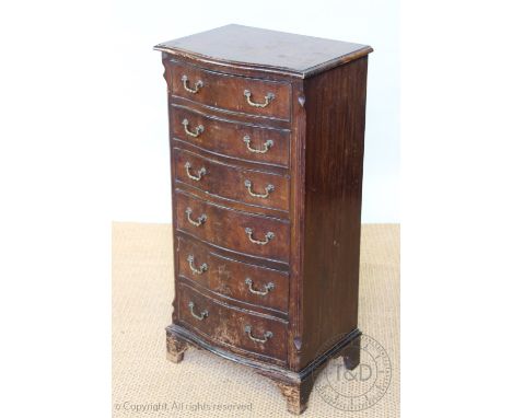 A walnut bow front pillar chest, with six drawers, on bracket feet 95cm H x 38cm W x 45cm D, with a modern walnut davenport a