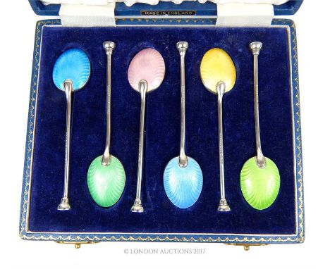 A cased set of six, sterling silver and brightly coloured, guilloche, enamel tea spoons with rounded end-terminals, maker: He