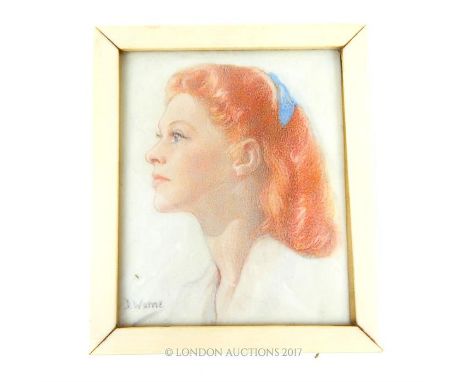 A charming, circa 1930's, portrait on ivory of the Prima ballerina Moira Shearer with flaming red hair and blue hair-band in 