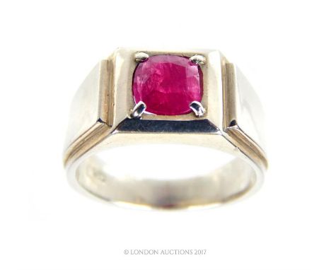 A substantial, Art Deco-style, handmade, Gentleman's sterling silver and natural, untreated ruby ring, composed of a central 
