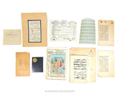 A collection of thirteen pieces of 19th century Persian Qujar period ephemera, including an unused Royal Ramily's paper seal 