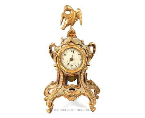 An 18th century Chinese Chippendale Carved painted and parcel gilt bracket clock with a later single fusee movement, and eagl