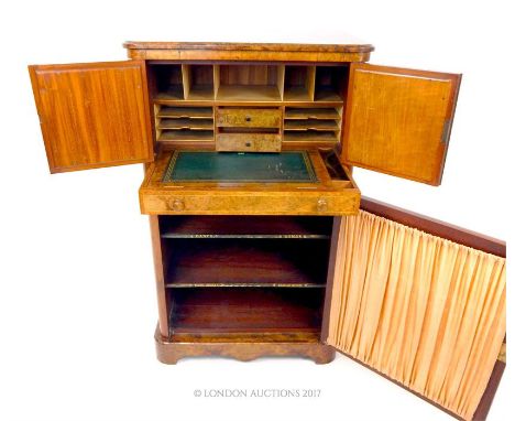 A compact Victorian walnut veneer, bureau with music cabinet below, decorated with boxwood inlays; 95.5cm high. 