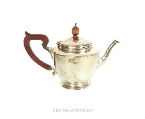 A George V silver bachelors silver teapot, Birmingham, 1930, Adie Brothers, of circular slightly panelled form on pedestal fo