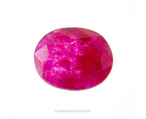 A 10.2 carat natural, oval shaped, faceted pink ruby with eye-visible inclusions, (loose stone) 0.9 x 0.7 mm. (Without docume