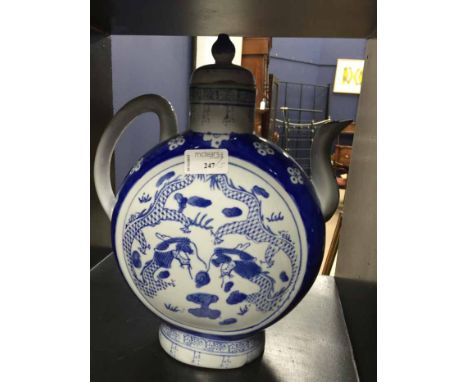 CHINESE BLUE AND WHITE CIRCULAR TEA POT 
together with a blue and  white lidded jar and three bowls