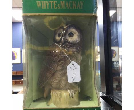 WHYTE & MACKAY ROYAL DOULTON OWL DECANTER
together with a pure malt whisky sheep decanter