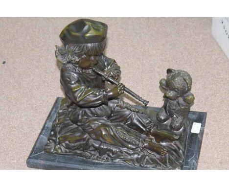 CAST METAL FIGURE OF YOUNG BOY
modelled playing a recorder with a teddy bear, on a marble base