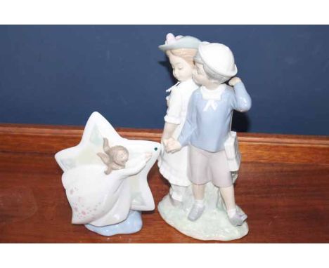 LLADRO FIGURE OF A BOY AND A GIRL
together with a Nao figure of a shooting star (2)