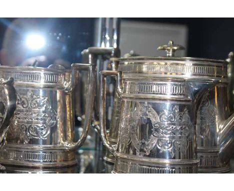 SELECTION OF SILVER PLATED AND BRASS ITEMS
including a Victorian-style three piece tea service, a teapot, two pairs of brass 