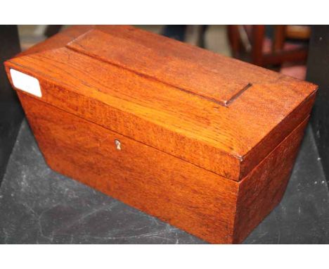 LATE 19TH CENTURY OAK SARCOPHAGUS TEA CADDY
of streamlined form, 28cm long