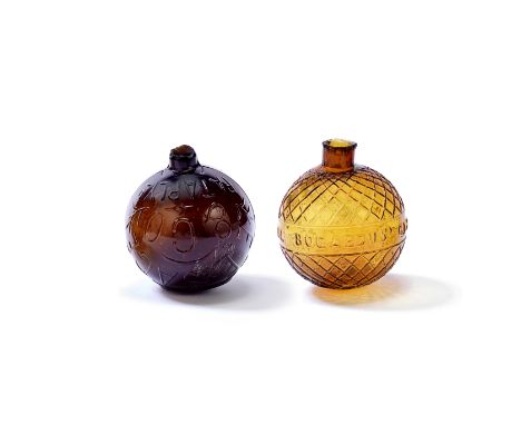 A very rare American glass target ball by E E Sage &amp; Co and an A H Bogardus ball, dated 1877Of moulded globular bottle sh