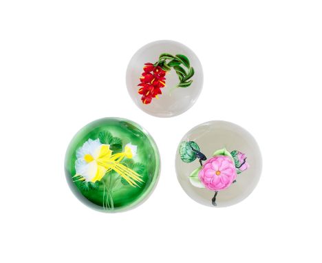 Three botanical paperweights, dated 1997 and 2003Comprising two Lundberg Studios weights by Daniel Salazar, one with yellow c