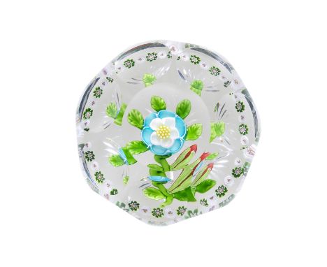 A rare Baccarat faceted and garlanded turquoise buttercup paperweight, circa 1850The flower with a row of six turquoise cuppe