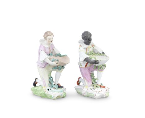 Two Derby sweetmeat figures, circa 1780-85Modelled as young men, one black and one white, both figures kneeling and balancing