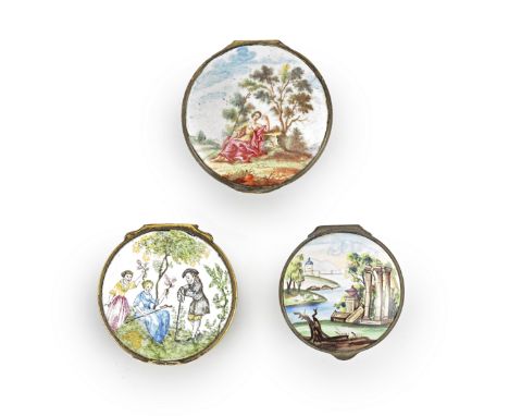 A London or Birmingham enamel box and two Birmingham boxes, circa 1750Of circular form, the first with gilt metal sides decor