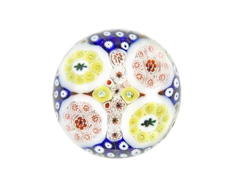 A very rare Bacchus patterned millefiori 'sodden snow' ground paperweight, circa 1850The distinctive canes in various sizes, 