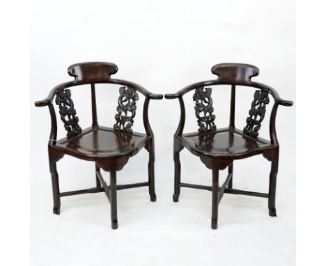 Pair of Antique Chinese  Carved Rosewood Corner Chairs. Dragon openwork scroll carved back rest, curved arms, high standing l