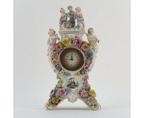 Meissen Style Porcelain Figural Clock. Signed. Losses to wings, flower petals. Not running. Measures 14-1/4"H. Shipping $85.0