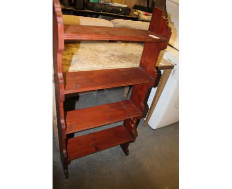 Stained pine wall shelf