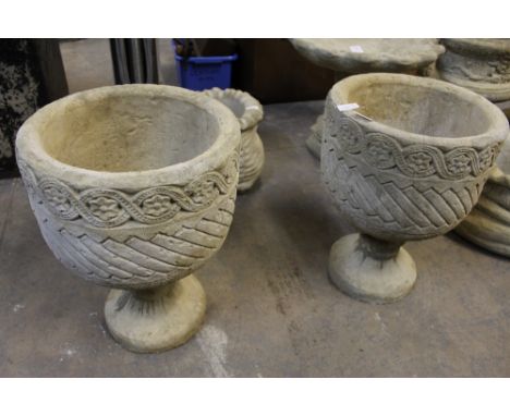 2 Mayan urns - circular planters decorated with Aztec design on circular base