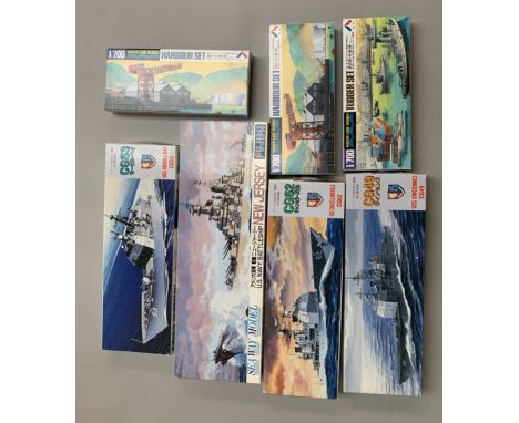 Seven Fujimi 1:700 scale plastic model kits, all ships. Boxed, unstarted and complete. 