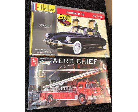 Two plastic model kits: Heller Citroen DS 19 1:16 scale; AMT 980/06 American LaFrance 1000 Series Aero Chief. Both sealed. (2