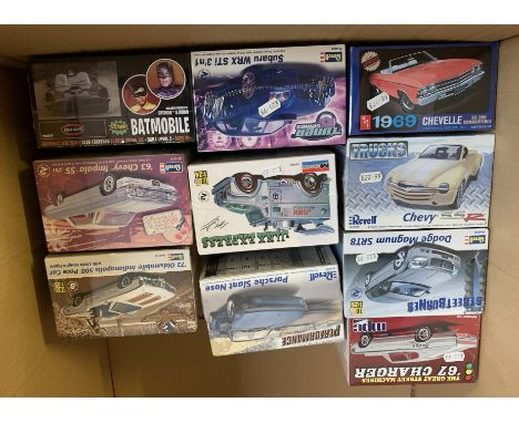 10 x plastic model kits, mostly cars by Revell and AMT, including a Polar Lights Batmobile 1:25 scale. Boxed, unstarted and c