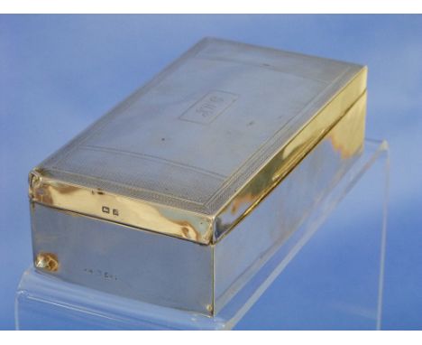 A George V silver Cigarette Box, hallmarked Birmingham, 1930, marks partly rubbed, of rectangular form with engine-turned dec