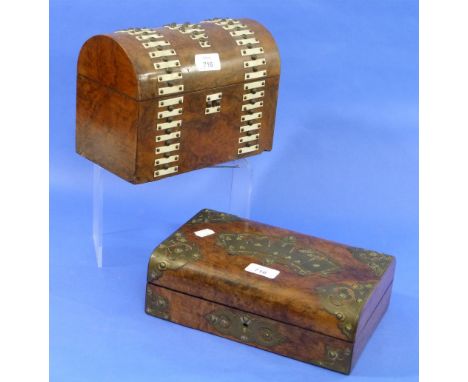 A late Victorian burr walnut Games Box, brass mountings in the form of playing cards, decorative escutcheon and corners, toge