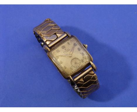 A Rolex 14ct gold square Chronometer wristwatch, the Super Balance movement timed to seven positions and with 17 jewels, the 