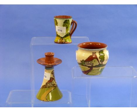 Crown Dorset Pottery; a twin handled motto-ware jug, Collard Poole, 3½in (8.5cm) high, together with a motto-ware candlestick