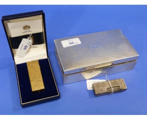 A vintage Dunhill gold-plated Rollagas Cigarette Lighter, in blue Dunhill case with instructions, and a vintage Dunhill silve