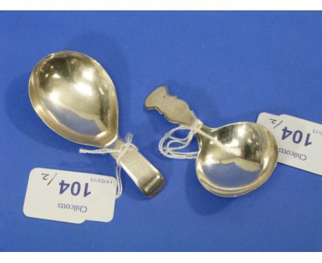 A George III silver Caddy Spoon, by Thomas James, hallmarked London, 1805, with shaped handle, 2¾in (7cm) long, together with